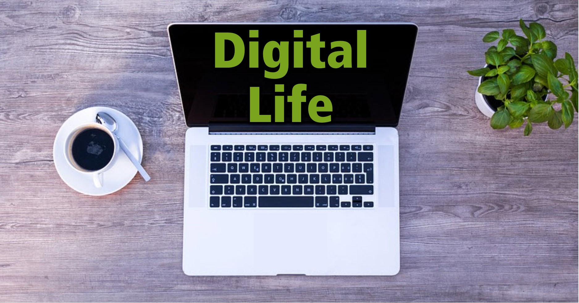 Open laptop and cup of coffee, with text that says "Digital Life"
