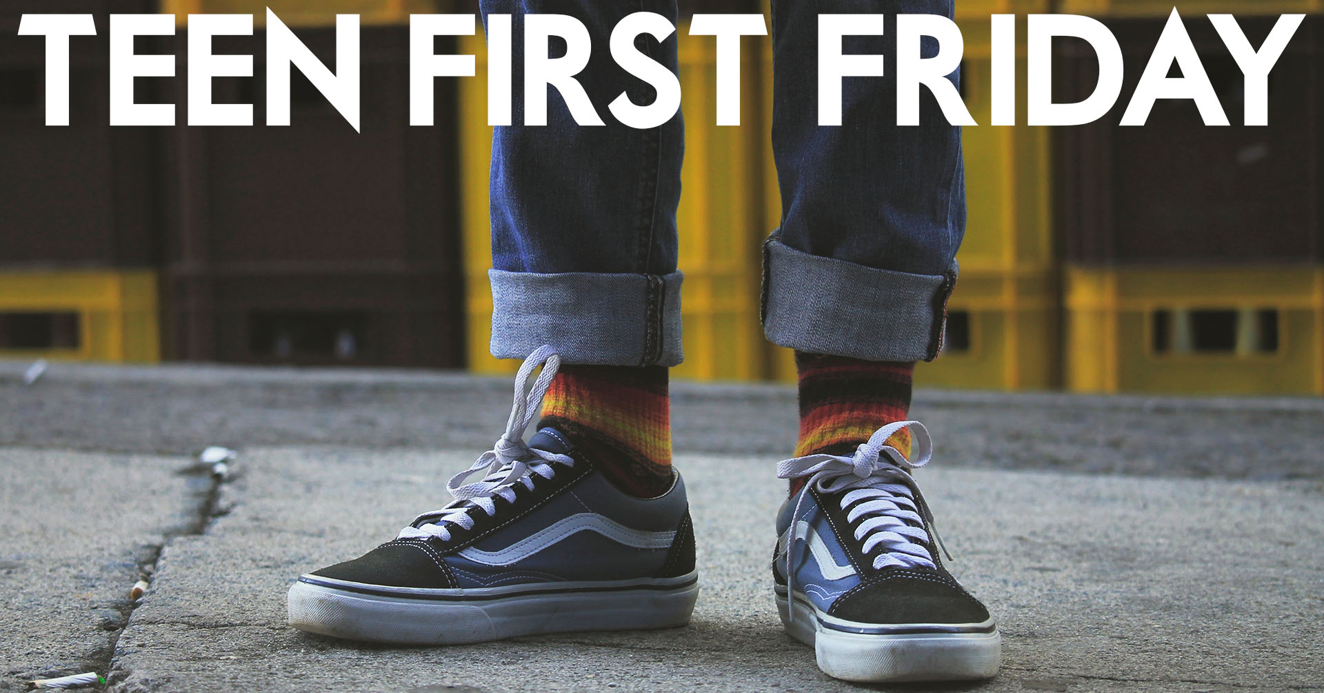 Feet of a person wearing sneakers and colorful socks, with text that says Teen First Friday