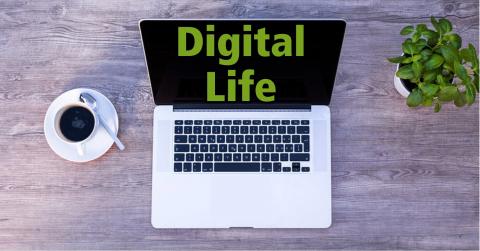 Open laptop and cup of coffee, with text that says "Digital Life"