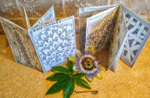 Photo of zines containing zentangles