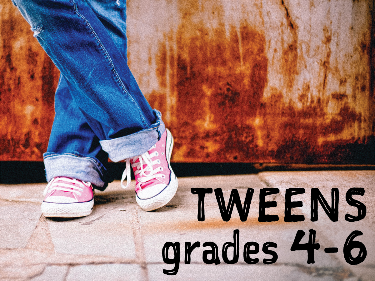 Tweens grades 4-6. Photo of standing legs wearing blue jeans and pink Converse